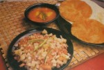 Anda Aaloo Dum With Puris at DesiRecipes.com